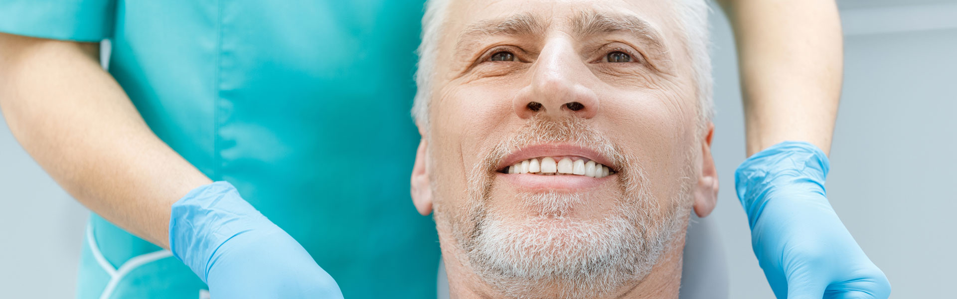 A man getting ready for dental dental implants treatment